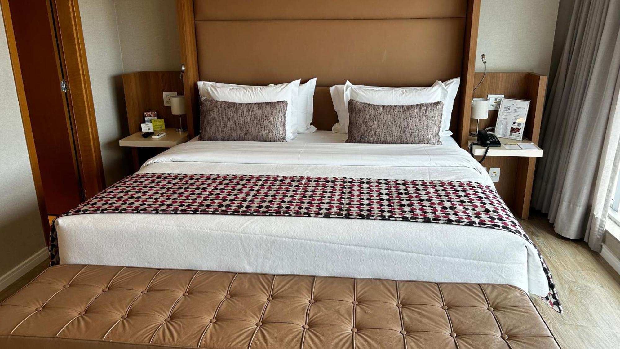 Jade Hotel Brasilia Candangolandia Exterior photo A bed