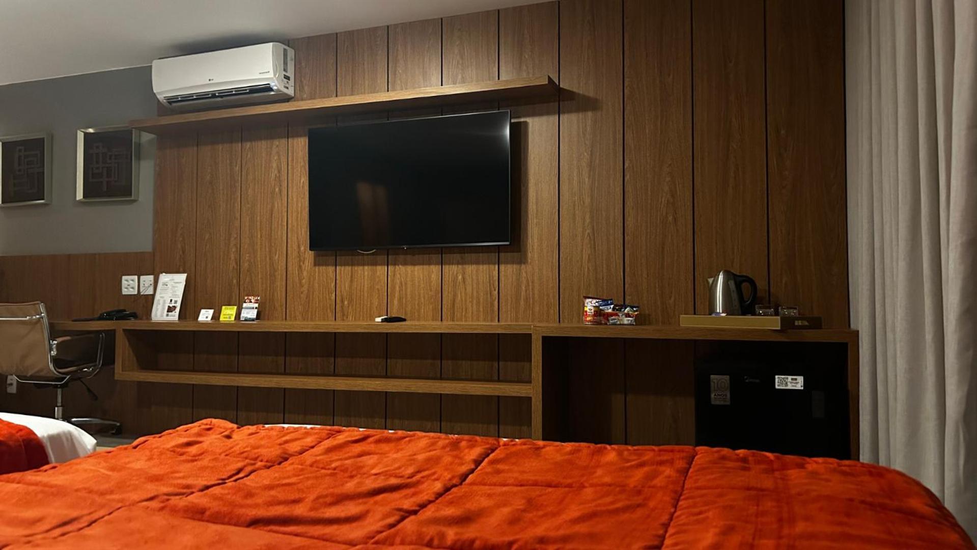 Jade Hotel Brasilia Candangolandia Exterior photo A television in a hotel room
