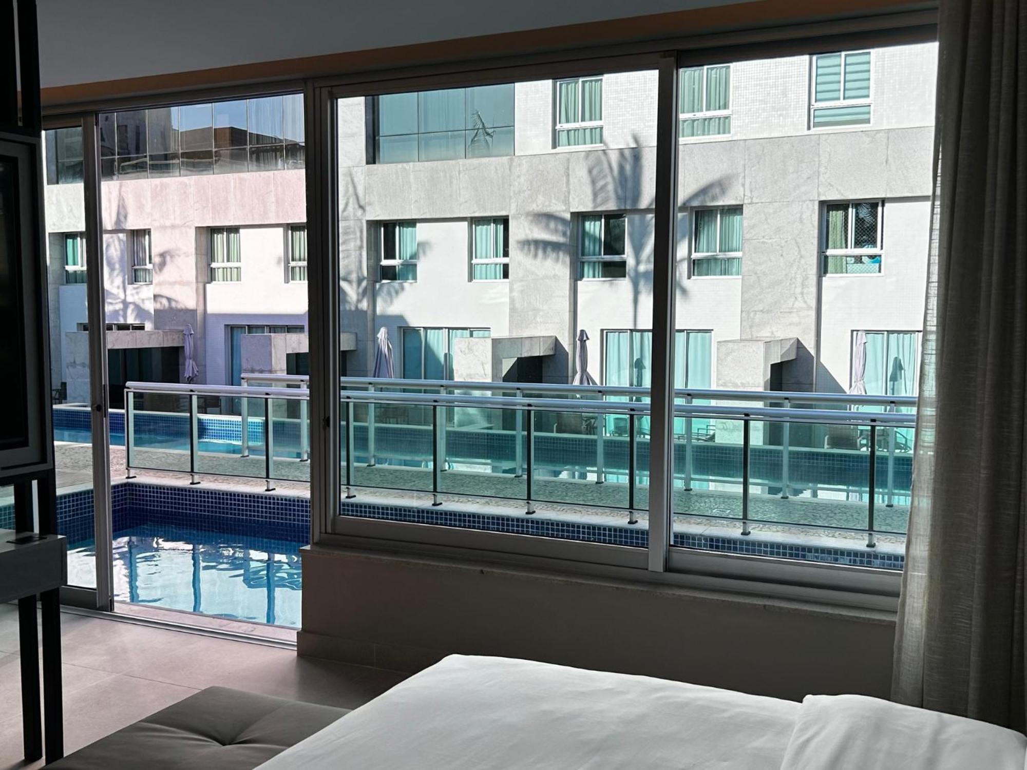 Jade Hotel Brasilia Candangolandia Exterior photo A view of the pool from a guest room